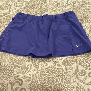 Cute Nike skirt with shorts underneath. Size M.